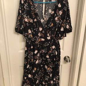 Black flower printed dress.